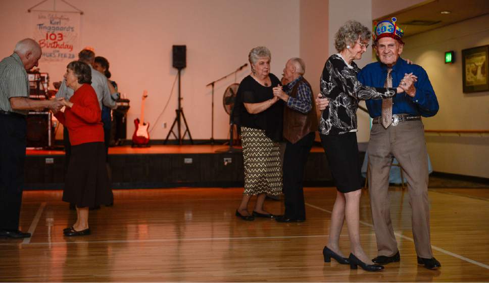 Francisco Kjolseth | The Salt Lake Tribune
Dorothy Dean, 89, joins Karl Tinggaard as he celebrates his 103 birthday by doing what he does every week, dancing at the Heritage Center in Murray on Thursday, February 23, 2017.