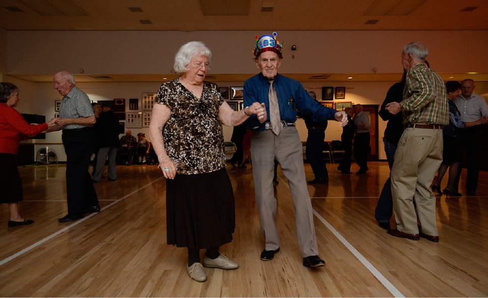 Francisco Kjolseth | The Salt Lake Tribune
Carol Miller, 81, is spun by Karl Tinggaard as he celebrates his 103 birthday by doing what he does every week, dancing at the Heritage Center in Murray on Thursday, February 23, 2017.