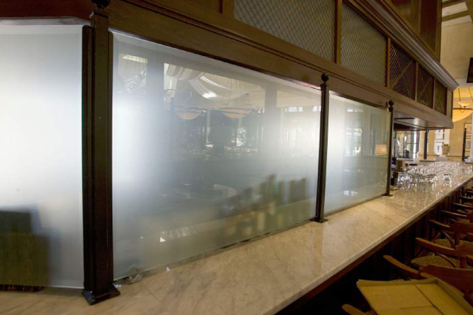 Tribune file photo
A frosted glass curtain hides a portion of the bar at Brio Tuscan Grille at Fashion Place Mall.