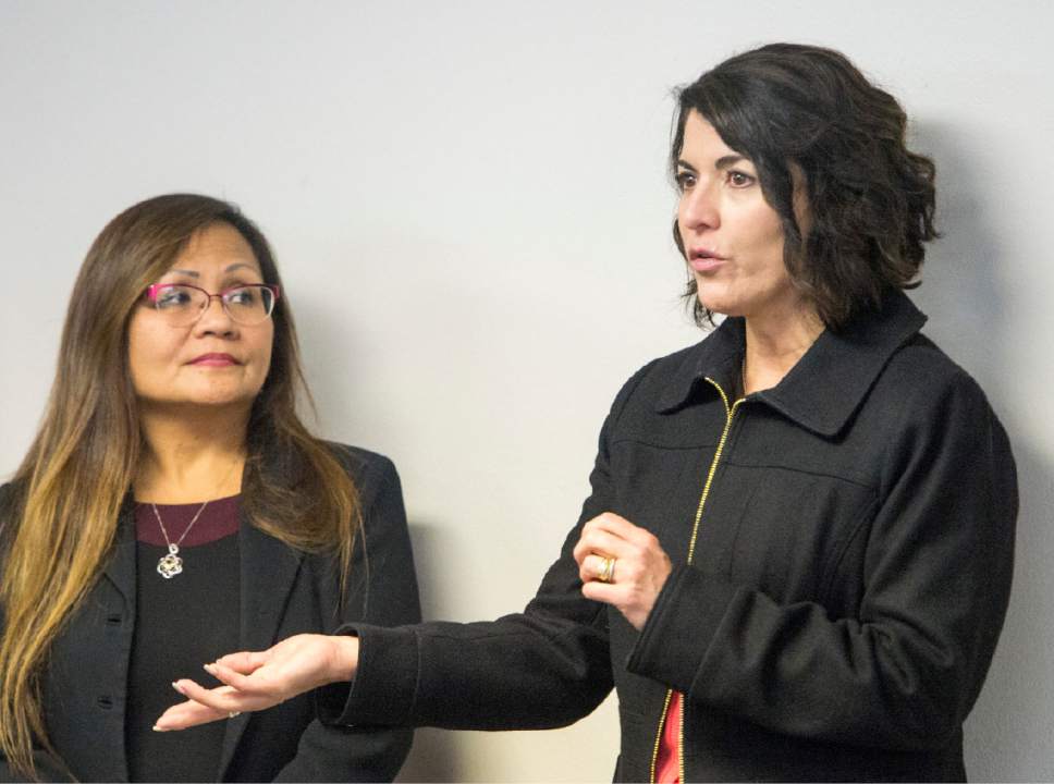 Rick Egan  |  The Salt Lake Tribune

Marlene Gonzalez  listens as Immigration attorney, Leonor Perretta takes questions from  a standing room only crowd during a "Know Your Rights" information session in the basement of the Mexican Consulate. The crowd was so large, it had do be split into two groups, Wednesday, February 22, 2017.