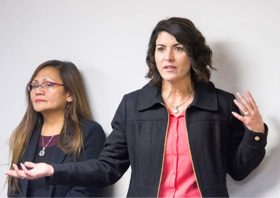 Rick Egan  |  The Salt Lake Tribune

Marlene Gonzalez  listens as Immigration attorney, Leonor Perretta takes questions from  a standing room only crowd during a "Know Your Rights" information session in the basement of the Mexican Consulate. The crowd was so large, it had do be split into two groups, Wednesday, February 22, 2017.