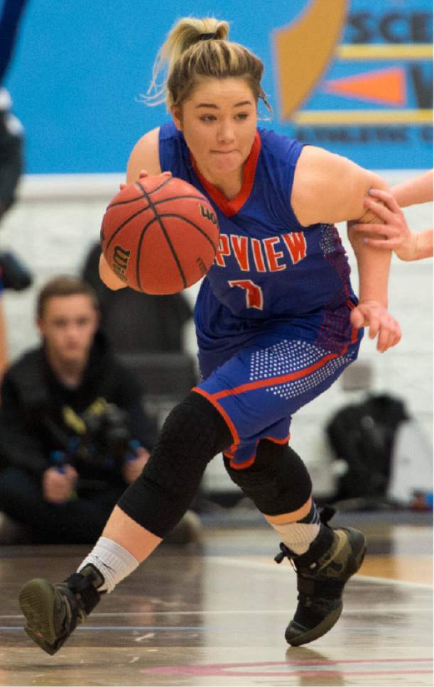 Rick Egan  |  The Salt Lake Tribune

Timpview Thunderbirds Kealani Neves (1) brings the ball down court, in 4A State playoff action, at SLCC, Thursday, February 23, 2017.