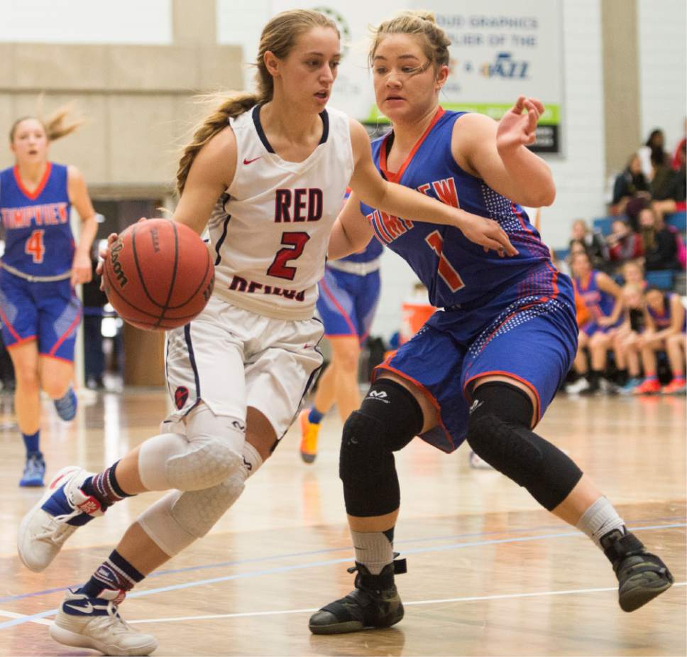 Rick Egan  |  The Salt Lake Tribune

Springville Red Devils Kami Warner (2) is guarded by Timpview Thunderbirds Kealani Neves (1), in 4A State playoff action, at SLCC, Thursday, February 23, 2017.