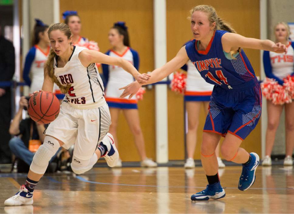 Rick Egan  |  The Salt Lake Tribune

Springville Red Devils Kami Warner (2) out  runs Timpview Thunderbirds Morgan Holbrook (14), in 4A State playoff action, at SLCC, Thursday, February 23, 2017.