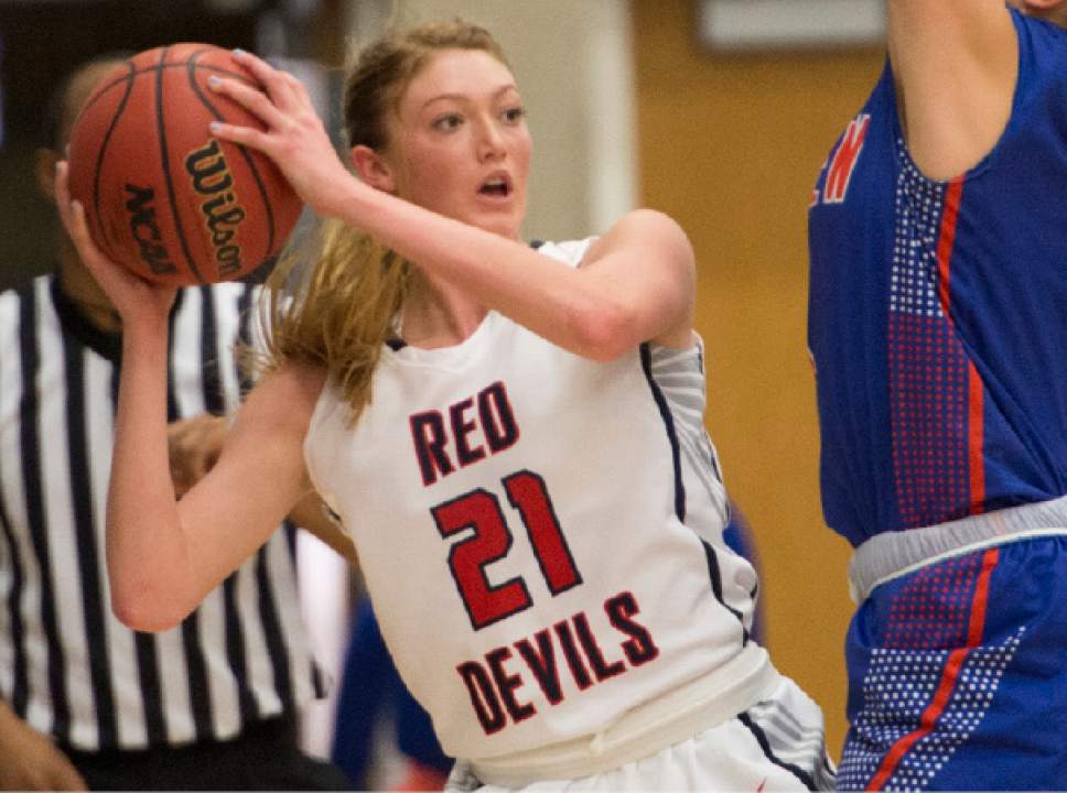 Rick Egan  |  The Salt Lake Tribune

Springville Red Devils Cheyanne Brown (21) looks to pass, in 4A State playoff action, at SLCC, Thursday, February 23, 2017.