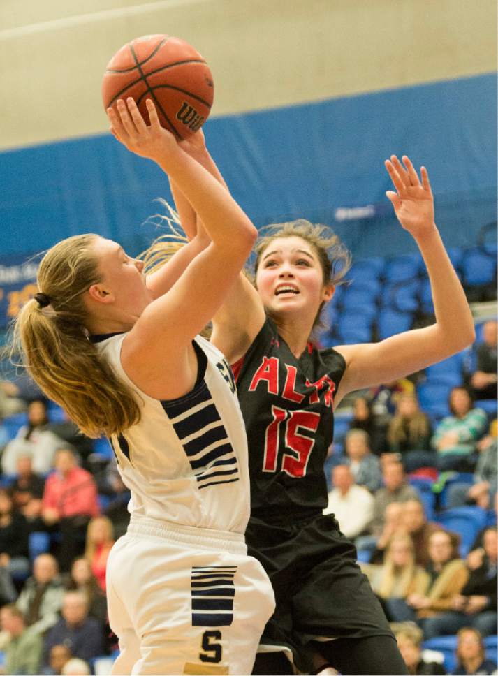 Rick Egan  |  The Salt Lake Tribune

Skyline Eagles Barrett Jessop (11) takes a shot, as Alta Hawks Kemery Martin (15) blocks the shot, Martin was called for a foul on the play, in 4A State playoff action, Skyline vs. Alta, at SLCC, Thursday, February 23, 2017.