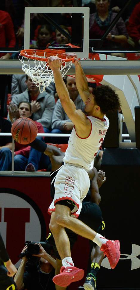 Francisco Kjolseth | The Salt Lake Tribune
Utah Utes guard Devon Daniels (3) gets a dunk past the Oregon Ducks during the second half of the NCAA college basketball game at the Huntsman Center in Salt Lake City, Thursday, Jan. 26, 2017.