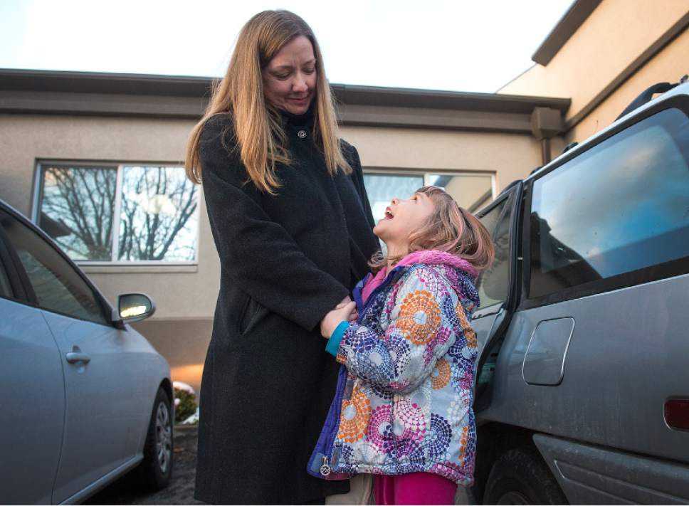 Leah Hogsten  |  The Salt Lake Tribune
"We need to continue the dialogue," said Kristen Jensen with her daughter Kyra about the placement of homeless shelters in the city. Jensen is happy to know that she will not have to move from Lil Scholars Learning Academy. Salt Lake City Mayor Jackie Biskupski announced on Friday, February 24, 2017 that the city will not move forward with the controversial Simpson Avenue site, nor the resource center that was planned for 648 W. 100 South, near the existing Road Home shelter. The planned resource centers at 275 W. High Ave. and 131 E. 700 South will be built to a larger capacity ó going from 150 to 200 beds each.