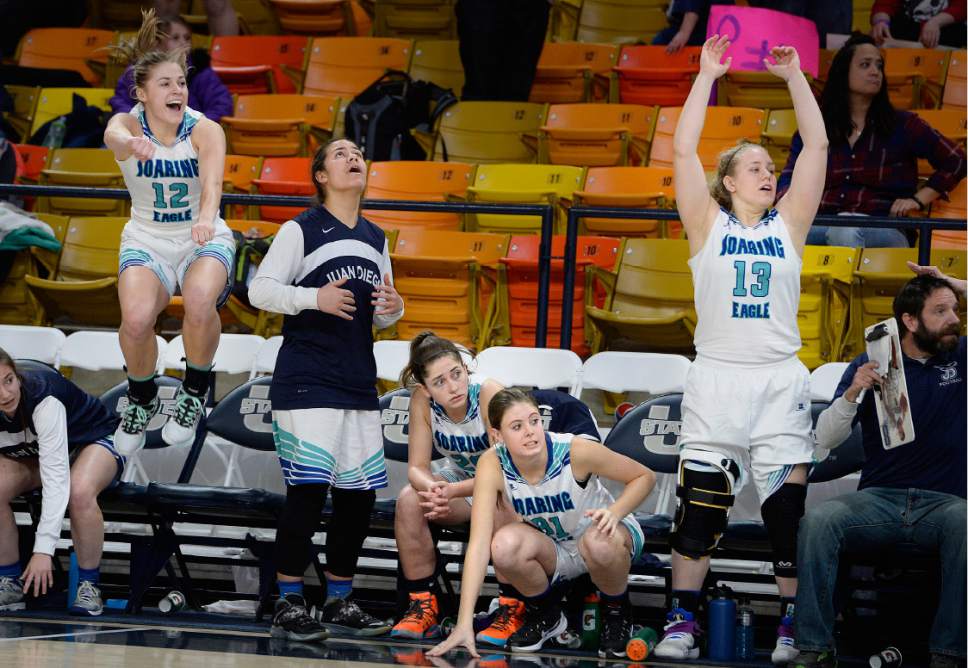 Scott Sommerdorf | The Salt Lake Tribune 
Players erupt on the Juan Diego bench in the final seconds as Juan Diego beat Carbon 53-50 in a Girl's 3A playoff played at USU, Friday, February 24, 2017.