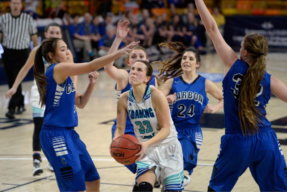 Scott Sommerdorf | The Salt Lake Tribune 
Juan Diego's Brynn Drummond drives the lane during second half play. Juan Diego beat Carbon 53-50 in a Girl's 3A playoff played at USU, Friday, February 24, 2017.