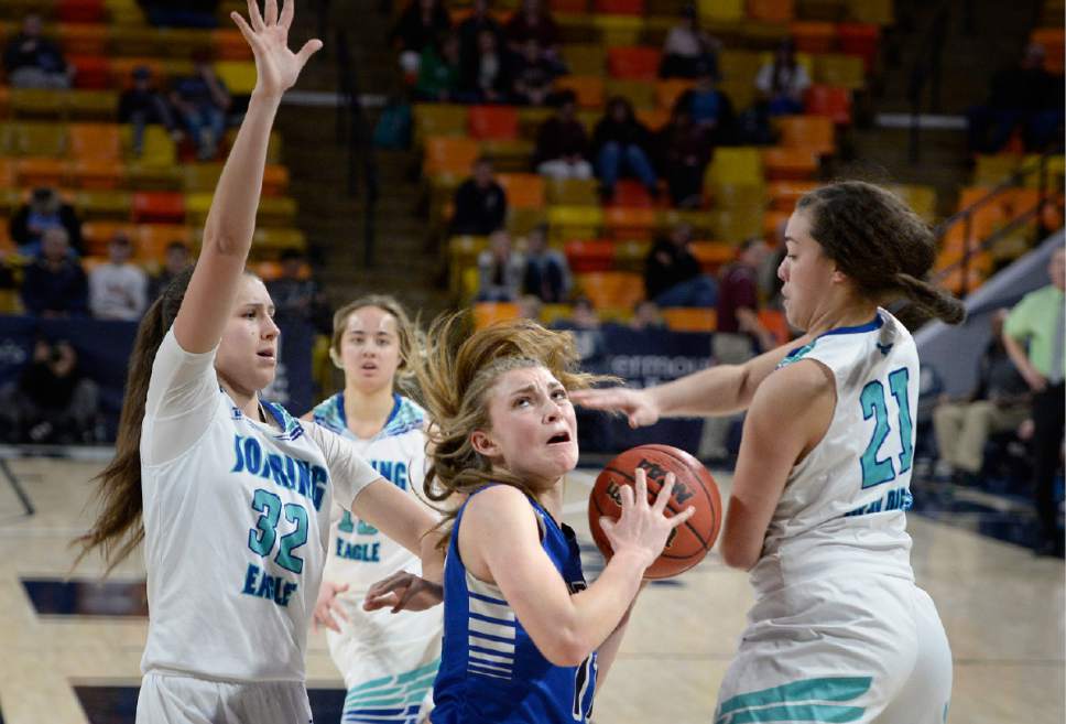 Scott Sommerdorf | The Salt Lake Tribune 
Carbon's Kelsey Sorenson powers through the Juan Diego defense to get a chance to score during second half play. Juan Diego beat Carbon 53-50 in a Girl's 3A playoff played at USU, Friday, February 24, 2017.