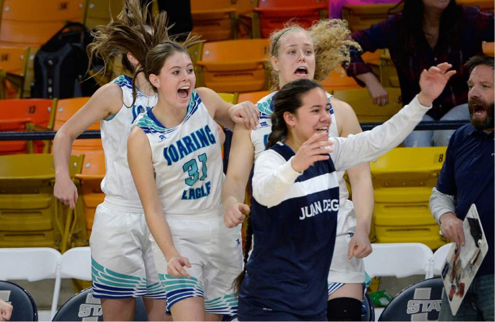 Scott Sommerdorf | The Salt Lake Tribune 
Players erupt on the Juan Diego bench in the final seconds as Juan Diego beat Carbon 53-50 in a Girl's 3A playoff played at USU, Friday, February 24, 2017.