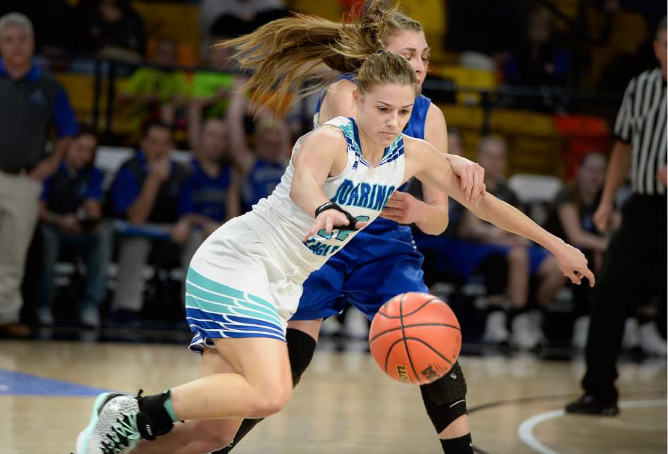 Scott Sommerdorf | The Salt Lake Tribune 
Rebecca Curran is fouled by Carbons' Kelsey Sorenson during first half play. Juan Diego beat Carbon 53-50 in a Girl's 3A playoff played at USU, Friday, February 24, 2017.