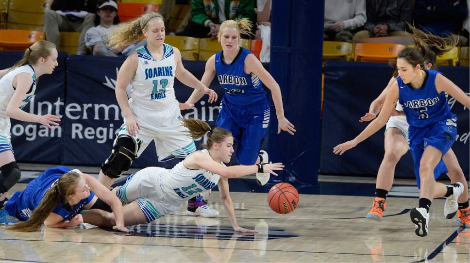 Scott Sommerdorf | The Salt Lake Tribune 
Juan Diego's Rebecca Curran dives for a loose ball during first half play. Juan Diego beat Carbon 53-50 in a Girl's 3A playoff played at USU, Friday, February 24, 2017.