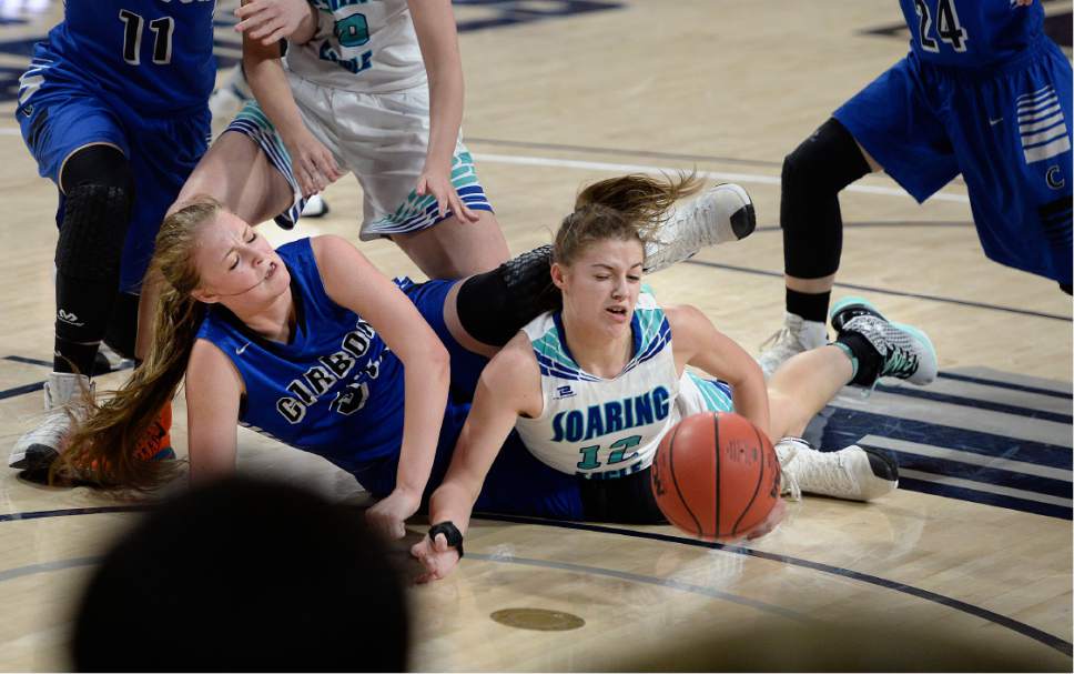 Scott Sommerdorf | The Salt Lake Tribune 
Carbon's McKenna Sorenson, left, and Juan Diego's Rebecca Curran dive for a loose ball during first half play. Juan Diego beat Carbon 53-50 in a Girl's 3A playoff played at USU, Friday, February 24, 2017.