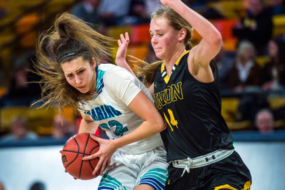 Chris Detrick  |  The Salt Lake Tribune
Juan Diego's Trista Vawdrey (32) is guarded by Union's Reagan Anderson (14) during the 3A playoff basketball game at Dee Glen Smith Spectrum in Logan Thursday February 23, 2017.
