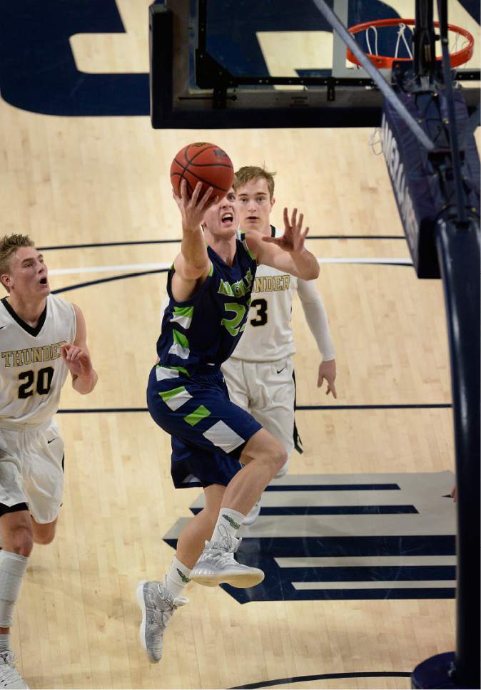 Scott Sommerdorf | The Salt Lake Tribune 
Jaxon Brenchley drives to make a layup during first half play. Ridgeline beat Desert Hills 64-60 in a Boy's 3A semi-final playoff played at USU, Friday, February 24, 2017.