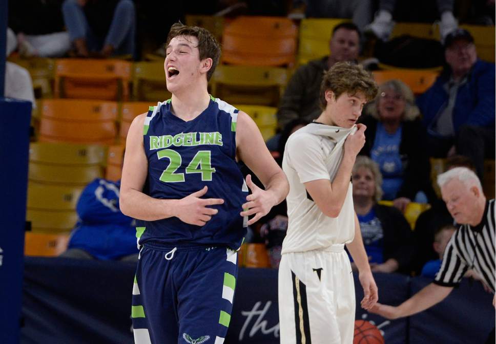 Scott Sommerdorf | The Salt Lake Tribune 
Theron Wallentine celebrates at the buzzer as Ridgeline beat Desert Hills 64-60 in a Boy's 3A semi-final playoff played at USU, Friday, February 24, 2017.