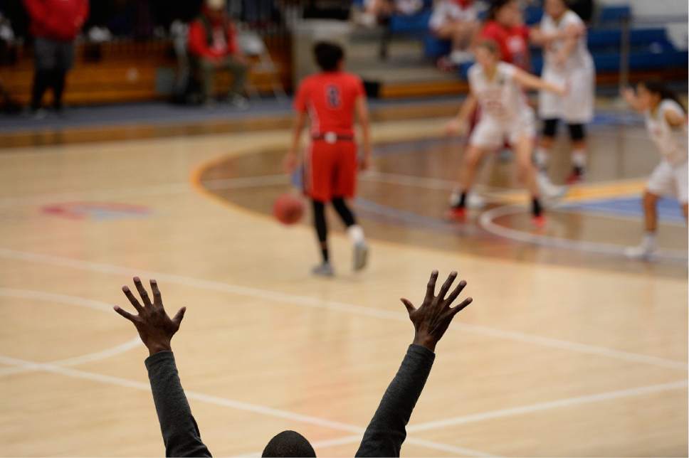 Scott Sommerdorf | The Salt Lake Tribune 
A Judge coach encourages his team to get their hands up on defense late in the game as Judge Memorial beat East 45-43 in a girl's 4A playoff game played at SLCC, Thursday, February 23, 2017.