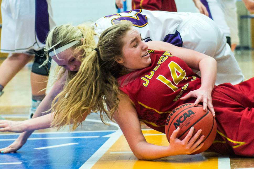 Chris Detrick  |  The Salt Lake Tribune
Judge's Emily Malouf (14) and Box Elder's Emily Isaacson (22) go for the ball during the 4A semifinal basketball game at Salt Lake Community College Friday February 24, 2017. Judge defeated Box Elder 45-34.