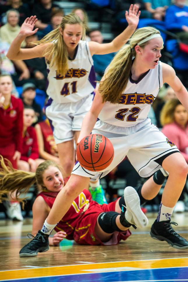 Chris Detrick  |  The Salt Lake Tribune
Box Elder's Emily Isaacson (22) gets a rebound past Judge's Emily Malouf (14) during the 4A semifinal basketball game at Salt Lake Community College Friday February 24, 2017. Judge defeated Box Elder 45-34.