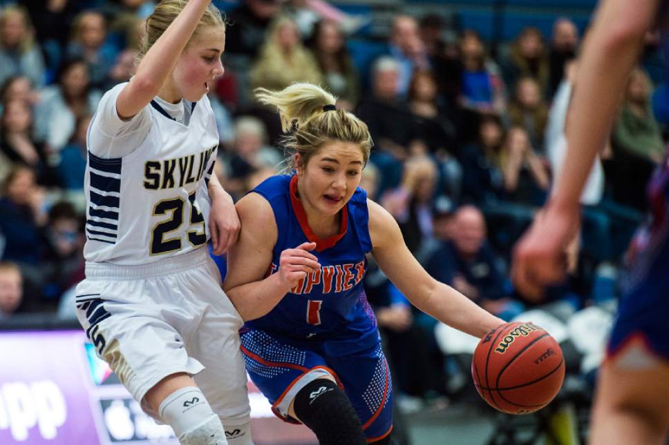 Chris Detrick  |  The Salt Lake Tribune
Timpview's Kealani Neves (1) runs past Skyline's Madison Grange (25) during the 4A semifinal basketball game at Salt Lake Community College Friday February 24, 2017. Skyline defeated Timpview 52-45.
