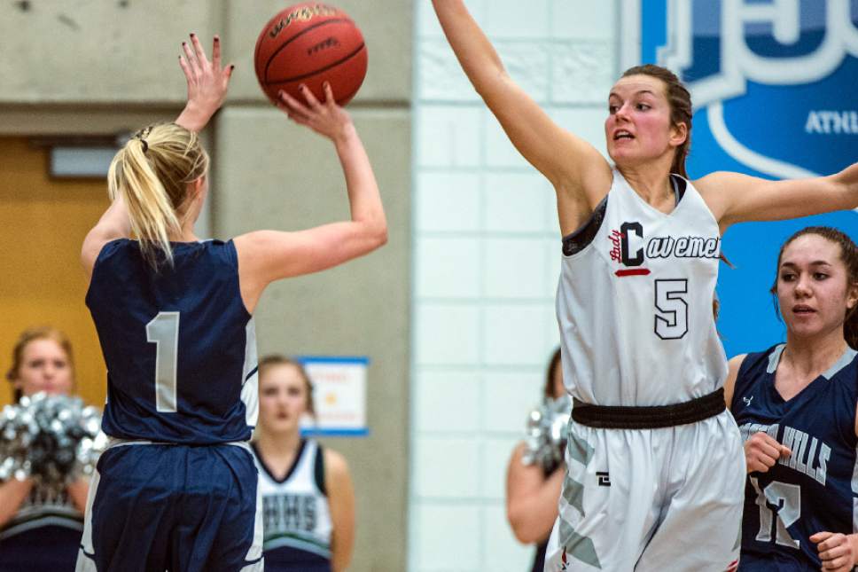 Chris Detrick  |  The Salt Lake Tribune
Copper Hills's Amberly Lazenby (1) shoots past American Fork's Savanna Empey (5) during the 5A semifinal basketball game at Salt Lake Community College Friday February 24, 2017. American Fork defeated Copper Hills 48-45.