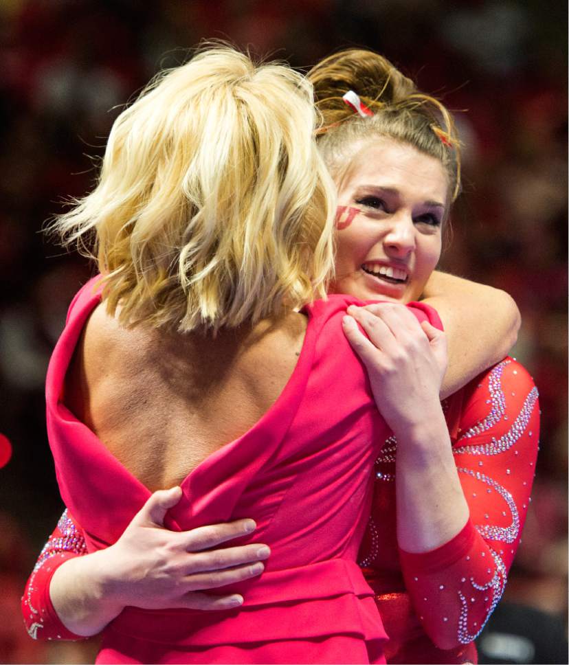 Rick Egan  |  The Salt Lake Tribune

Baely Rowe gets a hug from coach Megan Marsden after her performance on the beam for the Utes, in gymnastics action, Utah vs UCLA, at the Huntsman Center, Saturday, February 18, 2017.
