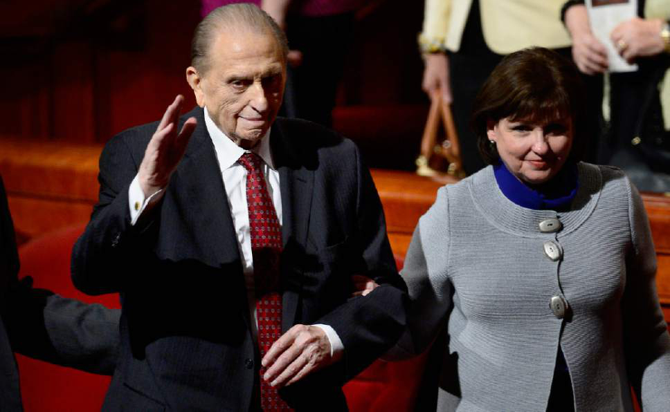 Scott Sommerdorf   |  The Salt Lake Tribune
President Thomas S. Monson, accompanied by his daughter Ann M. Dibb, waves as he leaves the morning session of the 185th Semiannual General Conference, Sunday, October 4, 2015.