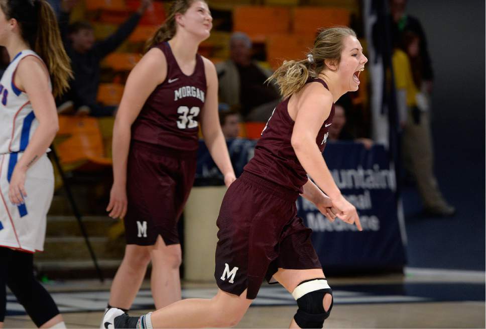 Scott Sommerdorf | The Salt Lake Tribune 
Morgan's Makennah Morrell reacts to a last second 3-pointer by Brookelynn Hurlbut that banked in before the half. Morgan led Richfield 26-22 at the half in a Girl's 3A playoff played at USU, Friday, February 24, 2017.