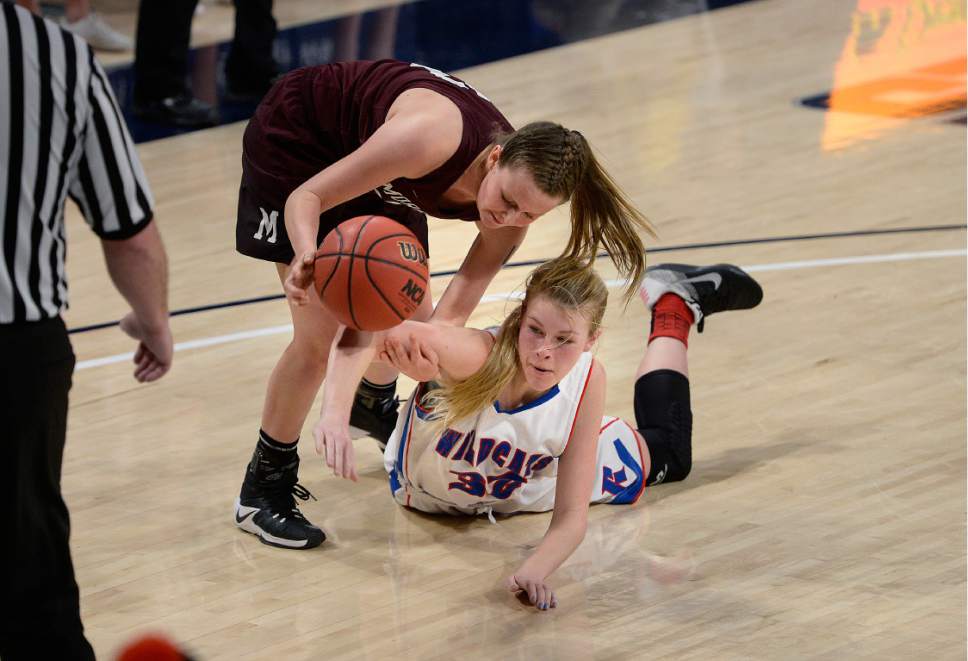 Scott Sommerdorf | The Salt Lake Tribune 
Richfield's Madison Roberts dives as she tries to control a pass versus Morgan's Morgan Cragun who comes up with the ball during second half play. Richfield beat Morgan 48-40 in a Girl's 3A playoff played at USU, Friday, February 24, 2017.