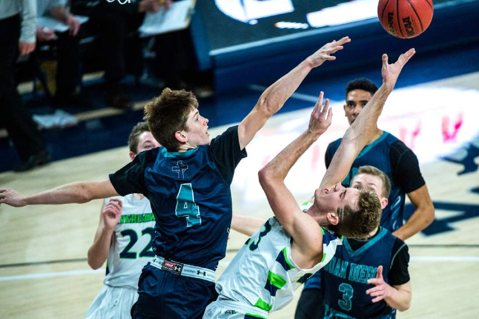 Chris Detrick  |  The Salt Lake Tribune
Juan Diego's JD Ahlstrom (4) fouls Ridgeline's Jaxon Brenchley (23) during the 3A boys' basketball state championship game at Dee Glen Smith Spectrum at Utah State University Saturday February 25, 2017.