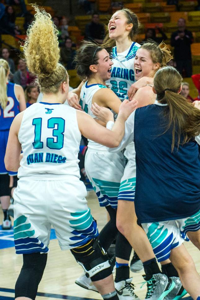 Chris Detrick  |  The Salt Lake Tribune
Members of the Juan Diego basketball team celebrate after winning the 3A girls' basketball state championship game at Dee Glen Smith Spectrum at Utah State University Saturday February 25, 2017. Juan Diego defeated Richfield 34-32.