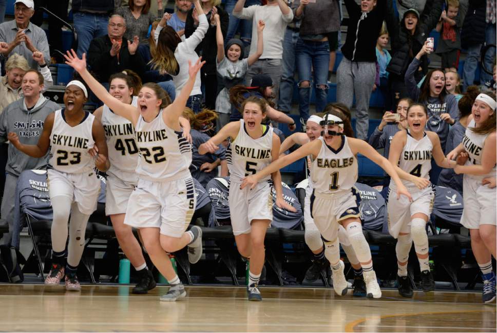 Scott Sommerdorf | The Salt Lake Tribune 
The Skyline bench empties to celebrate the win at center court. Skyline defeated Judge Memorial 60-57 in OT to take the Girl's 4A championship, Saturday, February 25, 2017.