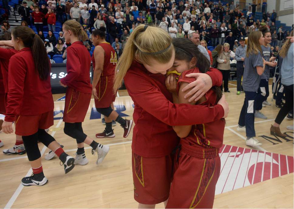 Scott Sommerdorf | The Salt Lake Tribune 
Judge players console each other after Skyline defeated Judge Memorial 60-57 in OT to take the Girl's 4A championship, Saturday, February 25, 2017.