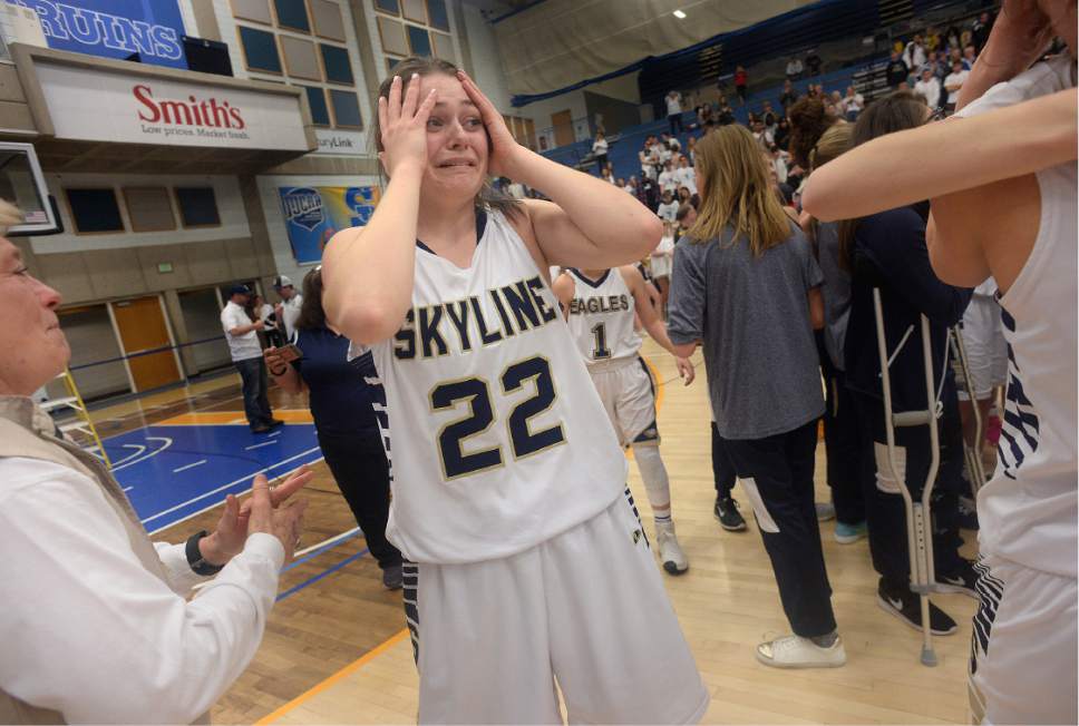 Scott Sommerdorf | The Salt Lake Tribune 
Annabelle Peterson kept saying "I can't believe it" as she and her team mates celebrated the win at center court. Skyline defeated Judge Memorial 60-57 in OT to take the Girl's 4A championship, Saturday, February 25, 2017.