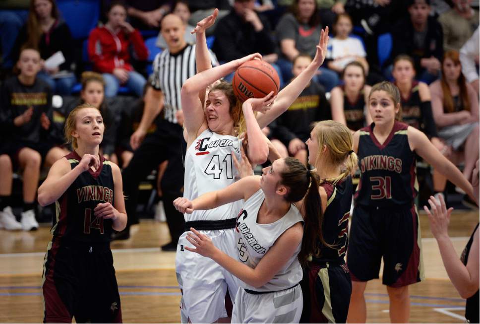 Scott Sommerdorf | The Salt Lake Tribune 
American Fork's Taylor Franson grabs a rebound under pressure during second half play. American Fork defeated Viewmont 50-46 for the Girl's 5A championship, Saturday, February 25, 2017.