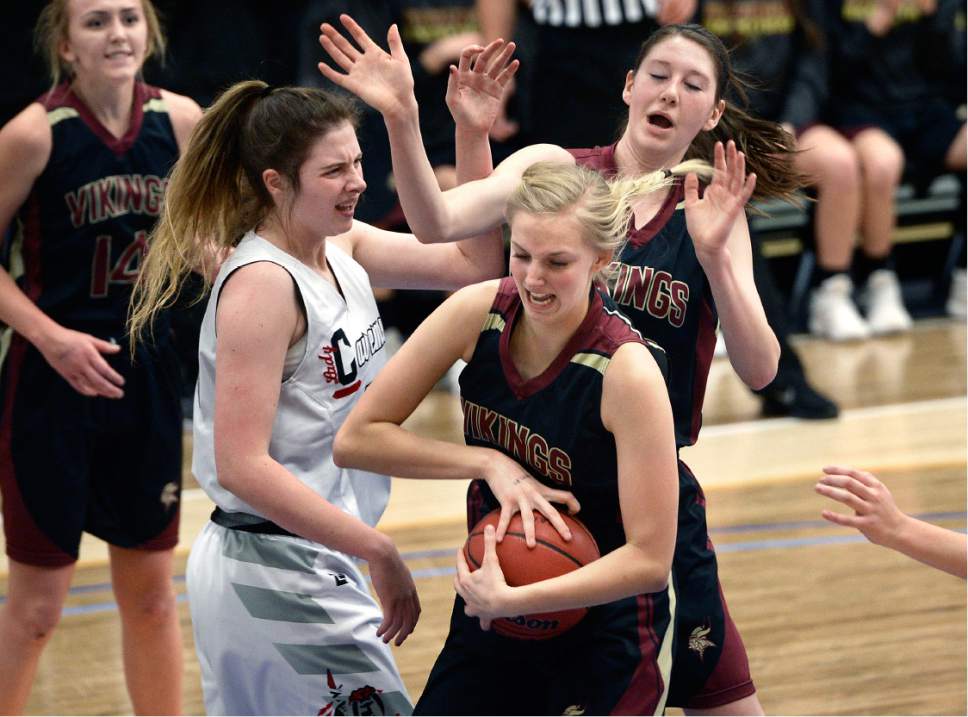 Scott Sommerdorf | The Salt Lake Tribune 
American Fork's Taylor Franson, left, moves in to pressure Viewmont's Samantha Hogge during second half play. American Fork defeated Viewmont 50-46 for the Girl's 5A championship, Saturday, February 25, 2017.