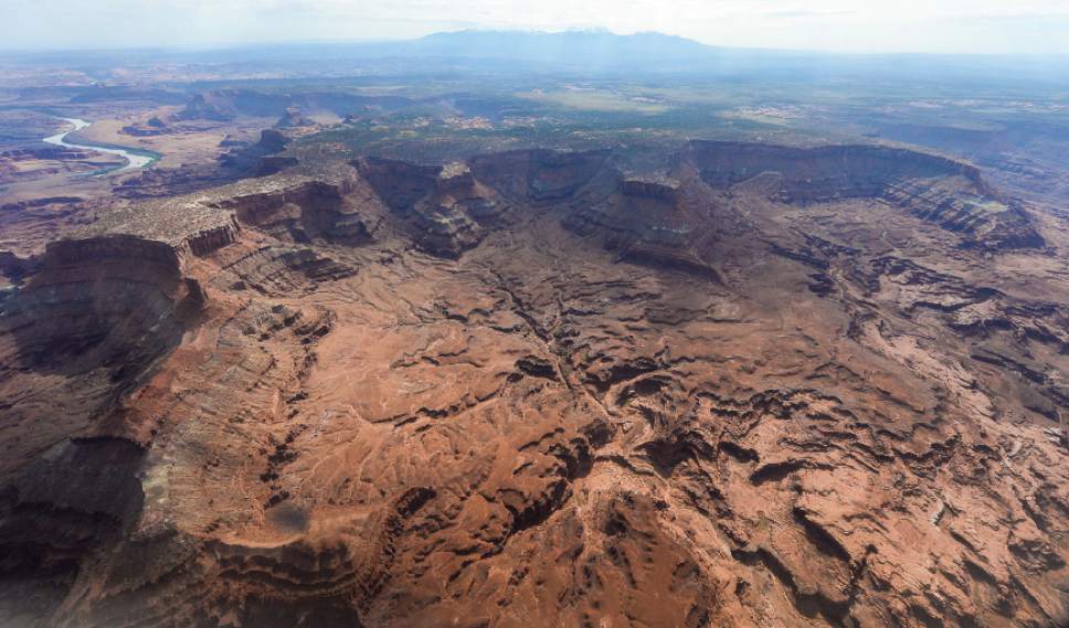 FILE -This May 23, 2016, file photo, shows Lockhart Basin, south of the Colorado River, within the boundary of the Bears Ears region in southeastern Utah. Utah lawmakers have already introduced about 700 bills this year, but resolutions that offer the Legislature's opinion on issues like national monuments and extend a welcome to refugees make up a slice of the action. One of the most impactful resolutions this year was a statement urging President Donald Trump to rescind the newly-named Bears Ears National Monument, citing it as a federal overreach. Utah's GOP-controlled Legislature and Gov. Gary Herbert moved to pass the resolution quickly. (Francisco Kjolseth/The Salt Lake Tribune via AP, File)