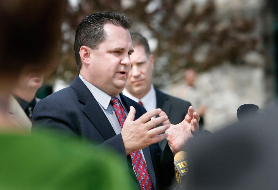 Scott Sommerdorf  |  Tribune File Photo
Davis County prosecutor Troy Rawlings announces in a press conference held outside the Davis County Justice Center that his office plans to file aggravated murder charges against Nathan and Stephanie Sloop in connection with the death of 4-year-old Ethan Stacy.