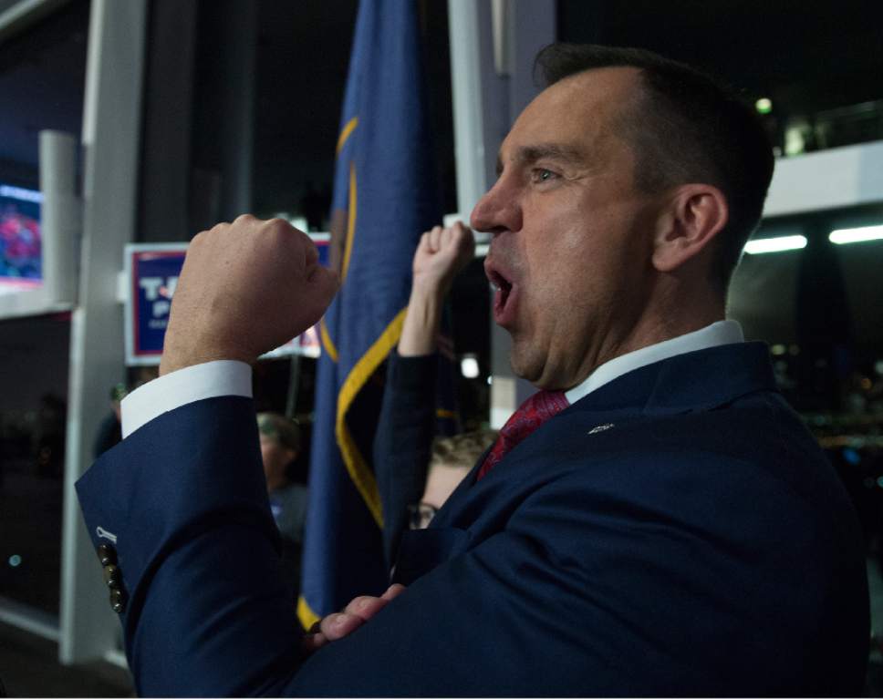 Leah Hogsten  |  The Salt Lake Tribune
After news swept the Utah GOP election party that the Associated Press called the election, giving Donald Trump the state of Pennsylvania and its prize of 20 electoral votes, Utah House Speaker Greg Hughes and supporters celebrated the news.