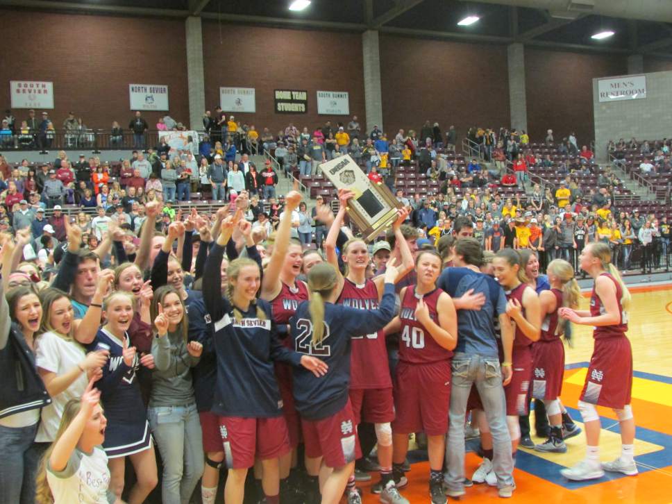 Tom Wharton  |  Special to the Tribune
The North Sevier girls' basketball team celebrates after it defeated Emery in overtime Saturday to win the Class 2A state championship at Sevier Valley Center in Richfield.
