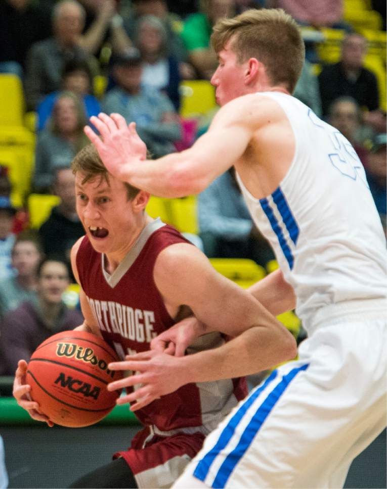Rick Egan  |  The Salt Lake Tribune

Northridge Knights Jensen Clifford (42) tries to get past Bingham Miners Branden Carlson (35), in State 5A basketball playoff action at UVU in Orem, Monday, February 27, 2017.