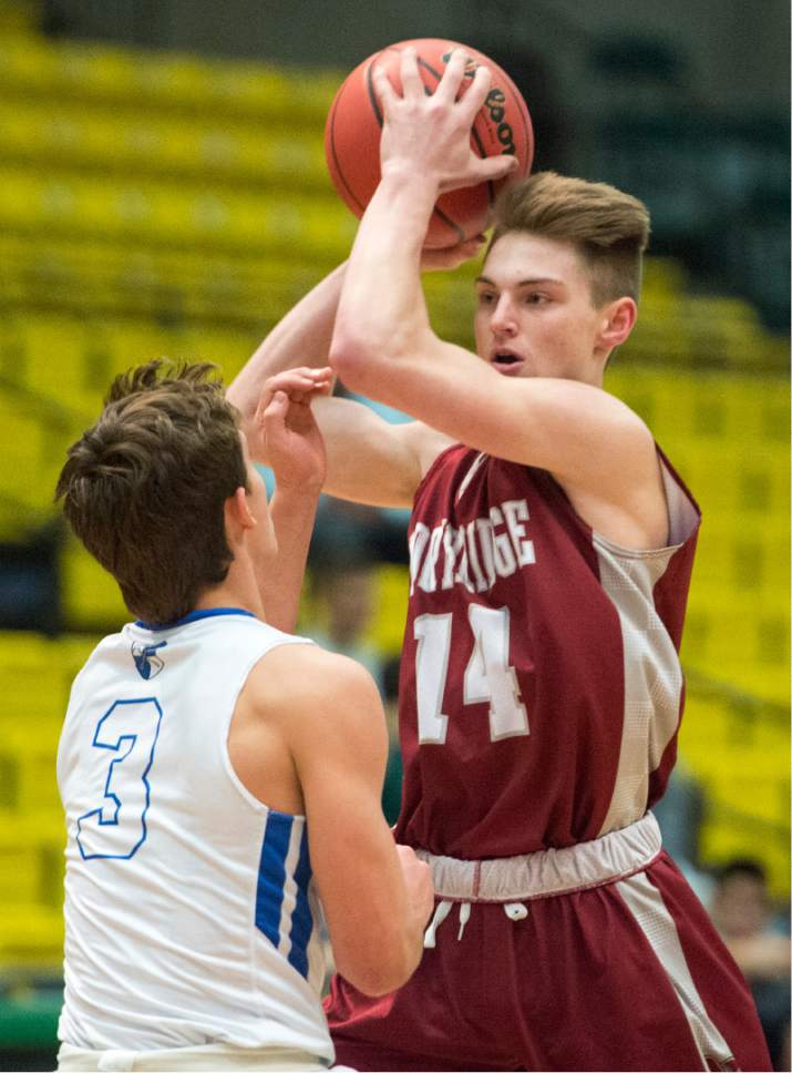Rick Egan  |  The Salt Lake Tribune

Northridge Knights Collin Barrett (14) looks to pass, as Bingham Miners Dax Milne (3) defends for the Miners, in State 5A basketball playoff action at UVU in Orem, Monday, February 27, 2017.
