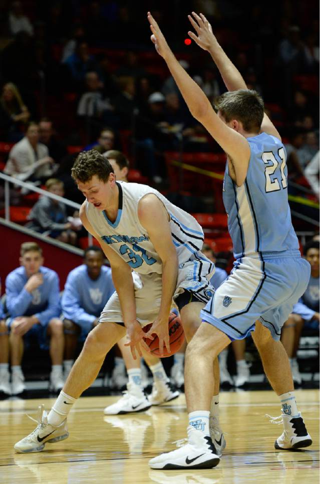 Francisco Kjolseth | The Salt Lake Tribune
Bracken Falslev of Sky View loses the ball as West Jordan's Bryan Banks puts on the pressure in the 5A boys' basketball playoff game at the Huntsman Center on the University of Utah campus on Monday, February 27, 2017.