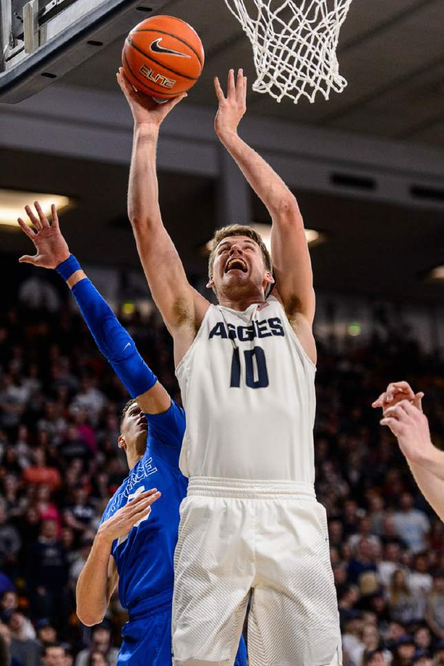 Trent Nelson  |  The Salt Lake Tribune
Utah State Aggies forward Quinn Taylor (10) shoots as Utah State hosts Air Force, NCAA basketball in Logan, Saturday February 25, 2017.