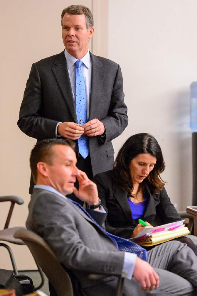 Trent Nelson  |  The Salt Lake Tribune
Seated at the defense table are defense attorneys Brad Anderson and Cara Tangaro during the John Swallow (standing) public-corruption trial in Salt Lake City, Tuesday February 28, 2017.