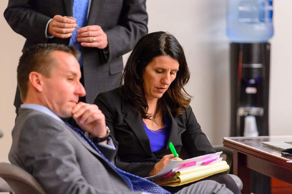 Trent Nelson  |  The Salt Lake Tribune
Seated at the defense table are defense attorneys Brad Anderson and Cara Tangaro during the John Swallow public-corruption trial in Salt Lake City, Tuesday February 28, 2017.