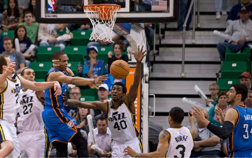 Lennie Mahler  |  The Salt Lake Tribune

Russell Westbrook kicks the ball out after driving on Jazz defense in the first half of a game between the Utah Jazz and Oklahoma City Thunder at EnergySolutions Arena on Saturday, March 28, 2015.