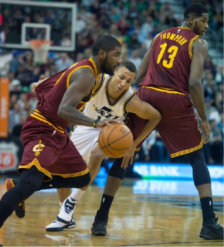 Steve Griffin  |  The Salt Lake Tribune


Cleveland Cavaliers guard Kyrie Irving (2) runs Utah Jazz guard Dante Exum (11) through a screen set by Cleveland Cavaliers forward Tristan Thompson (13) during first half action in the Jazz versus Cavs NBA game at EnergySolutions Arena in Salt Lake City, Wednesday, November 5, 2014.